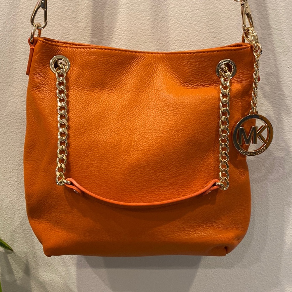 Soft orange Michael Kors leather crossbody handbag